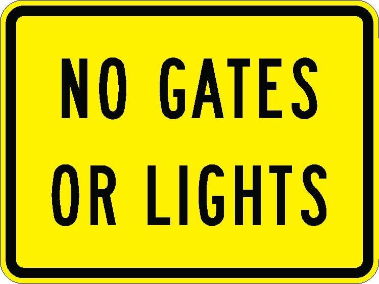 W10-13 - No Gates or Lights Sign