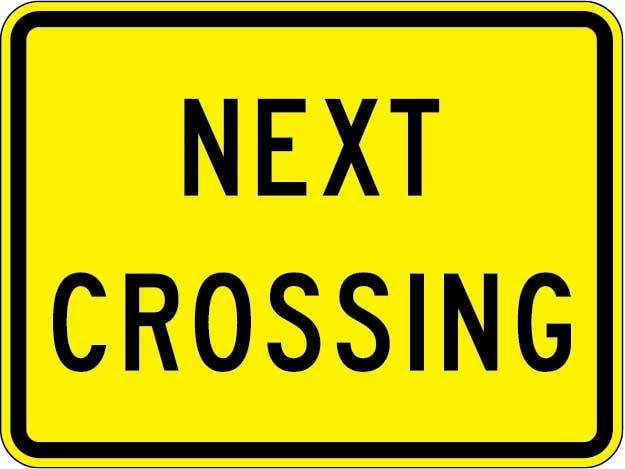  W10-14P - Next Crossing Plaque Sign