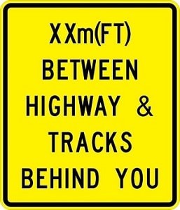 W10-11b - Between Highway And Tracks Sign