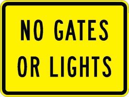 W10-13p - No Gates or Lights Sign