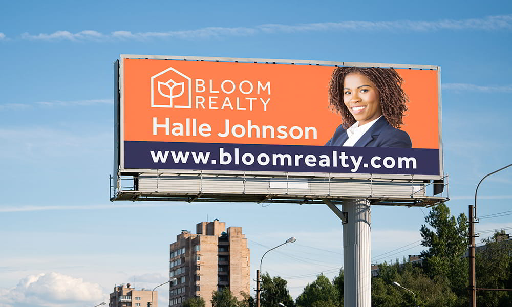 Real estate sign displayed in front of a home for sale