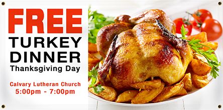 White vinyl banner with the text "FREE TURKEY DINNER. Thanksgiving Day. Calvary Lutheran Church 5:00pm - 7:00pm." The word "FREE" is in larger red lettering, while the other text is black. The dinner hours are also in red. To the right of the text there is a savory photo of a golden brown cooked turkey.