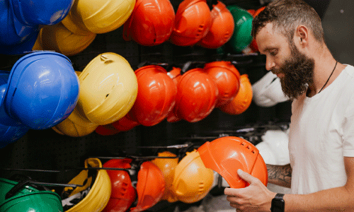 Man inspecting hard hats