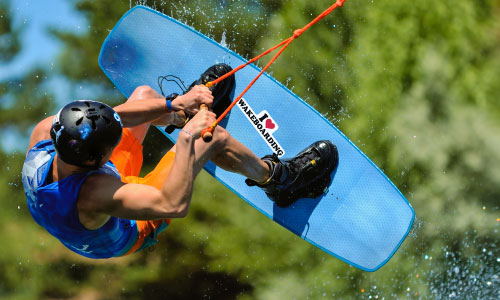 Colorful sticker on blue wakeboard 