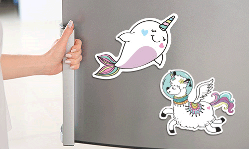 A narwhal custom magnet and sheep custom magnet on a fridge door being held open by a female hand.