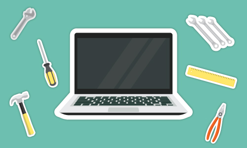 Decal of a laptop surrounded by screwdriver, hammer, pliers, ruler and socket set decals