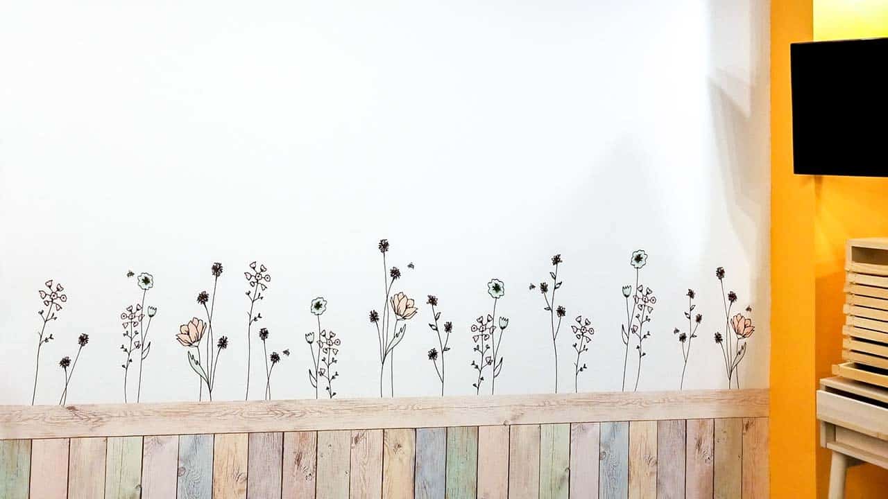 Decorative Wall Decal of flowers that look like they are climbing a wall