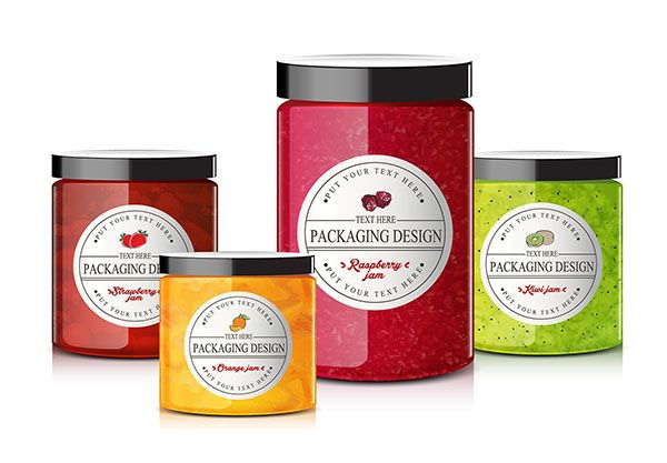 Custom Jam and Jelly Labels on assorted colored jars.