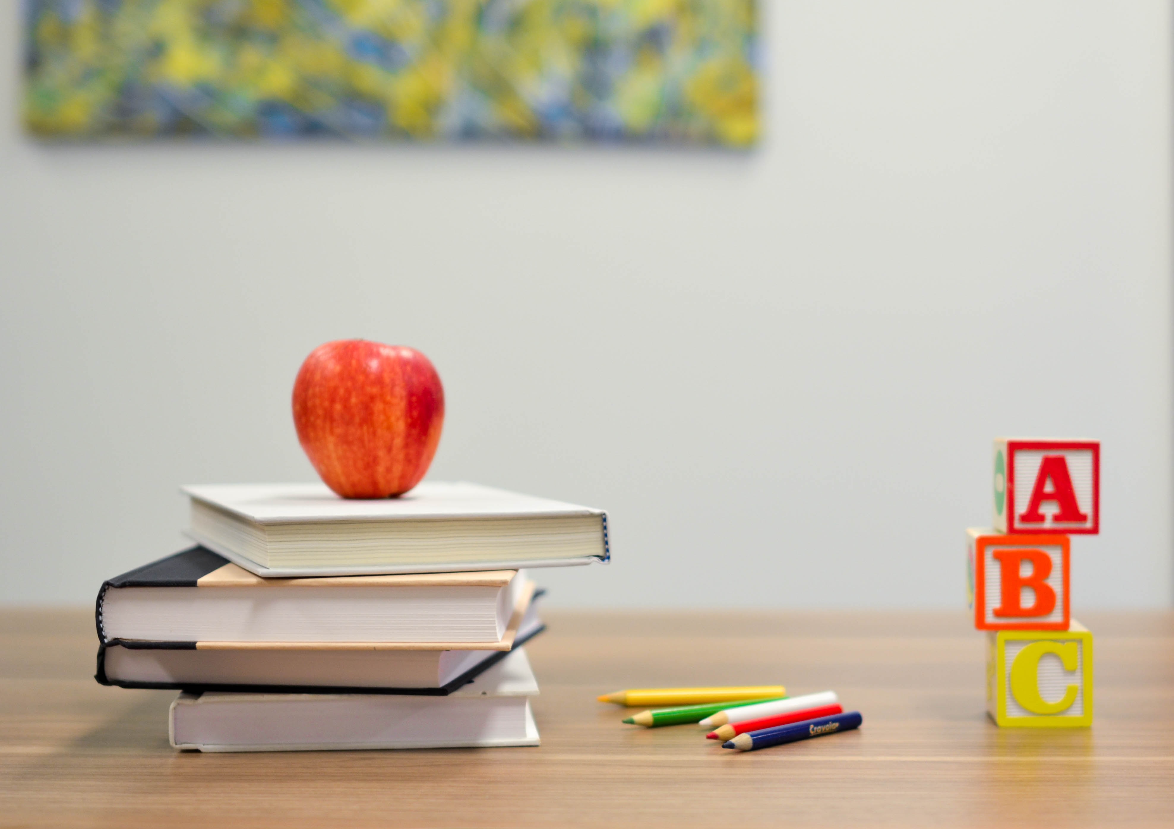 Teacher's Desk with books and apple