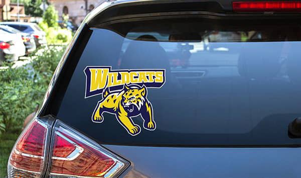 yellow wildcat mascot sticker on rearview car window