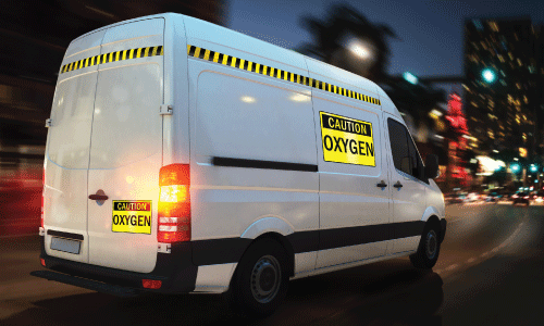 Reflective caution stickers on van