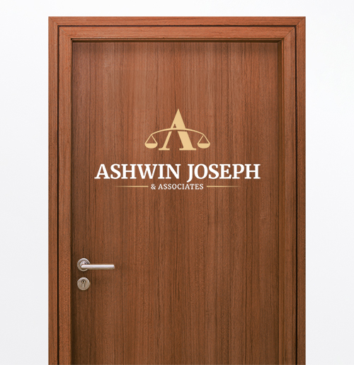 door with Ashwin Joseph logo sticker on it