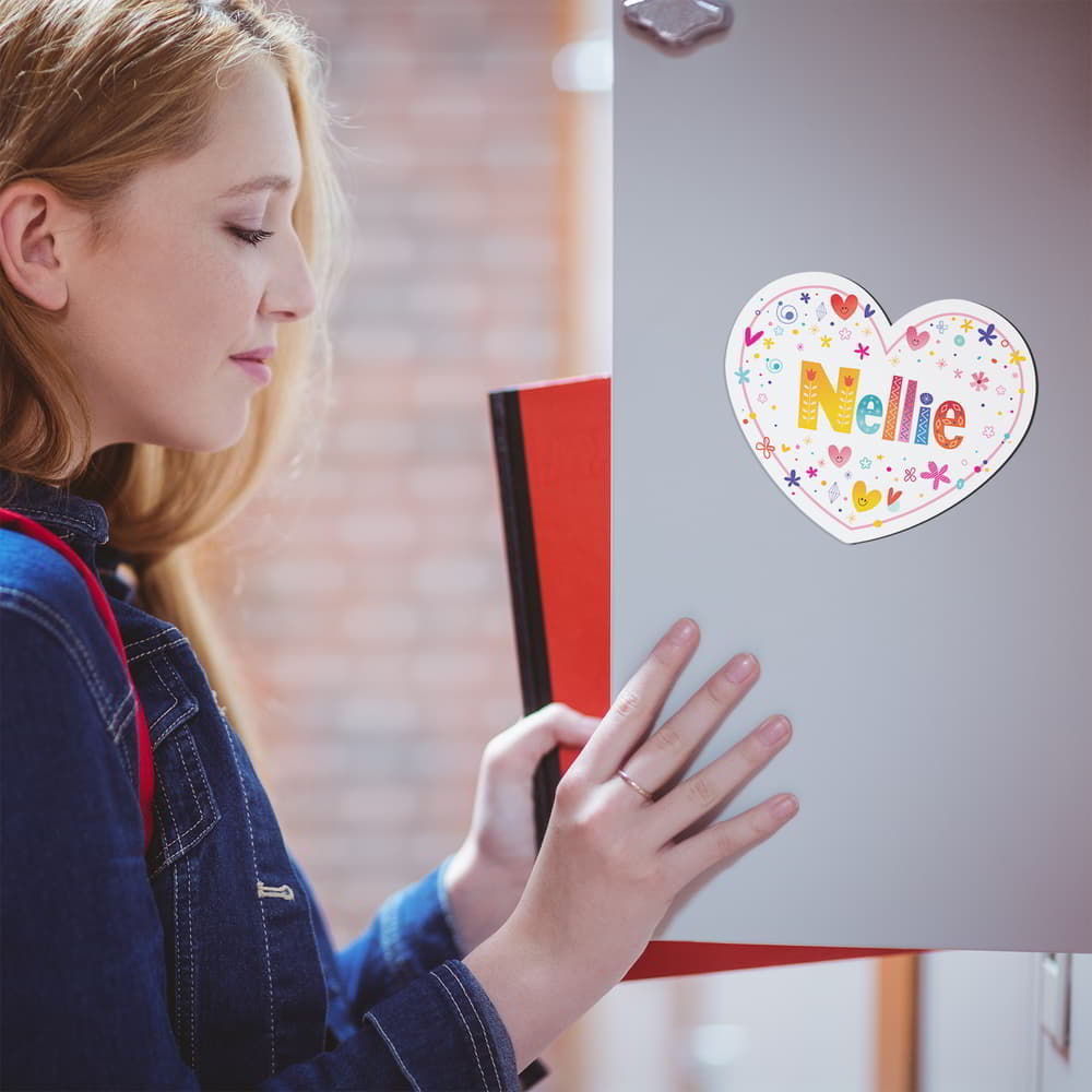 Girl opening up locker with a custom name Magnet that says Nellie