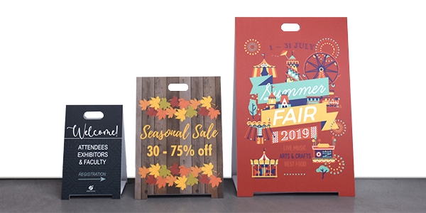 Header image of three Coroplast A Frame Signs in a row advertising different events in sizes 18 inches by 12 inches, 24 inches by 18 inches and 36 inches by 48 inches.