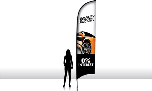 13 foot razor flag next to the silhouette of a woman.