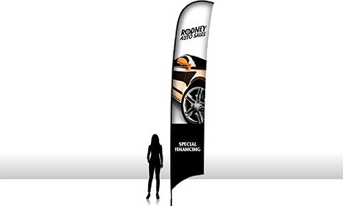 17 foot razor flag next to the silhouette of a woman.