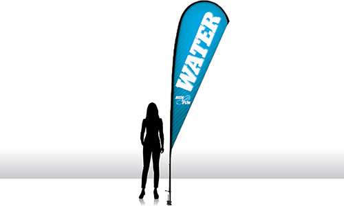 11.5 foot tear drop flag next to the silhouette of a woman.