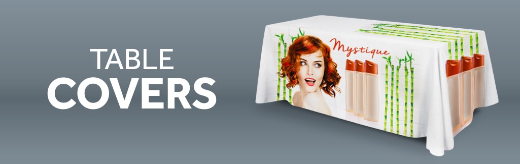 Full color table covers header image with graphic of table cover featuring a red haired lady advertising makeup.